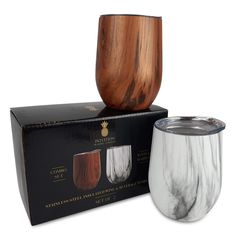 two different types of wine glasses sitting next to each other on top of a box