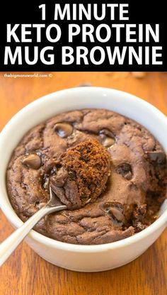 a close up of a spoon in a bowl of chocolate chip cookie mug brownie