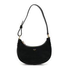 This is an authentic CELINE Smooth Calfskin Ava Shoulder Bag in Black. This bag is crafted of calfskin leather in black. It features an adjustable leather strap with gold hardware and opens with a top zipper to a matching interior. Shoulder Bag Black, Gold Hardware, Calf Skin, Leather Straps, Purse, Shoulder Bag, Purses And Bags, Zipper