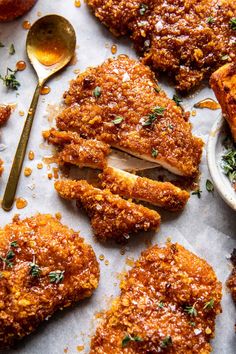 fried chicken cut in half and served on parchment paper