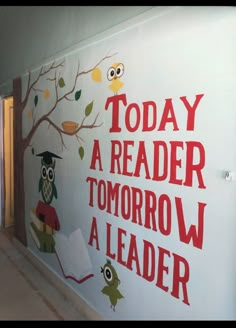 a wall painted with words and owls on it that says today a reader is tomorrow a leader