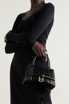 Balenciaga's tote has the same sculptural 'Hourglass' shape as the label's signature blazers. It's been made in Italy from panels of glossed croc-effect leather and decorated with a burnished gold-tone 'B' logo. Stow your cardholder, phone and keys inside and carry it by the top handle or removable shoulder strap. Balenciaga Hourglass Bag, Balenciaga Tote, Balenciaga Bag, Lady Dior Bag, Fashion Advice, Get The Look, Net A Porter, Women Collection, Leather Tote