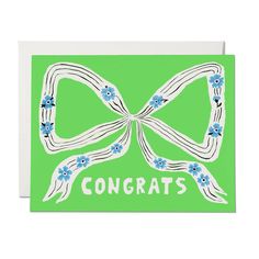 a green greeting card with the words congrats written in white and blue flowers