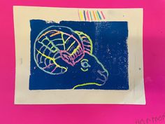 a child's drawing of a turtle on a piece of paper