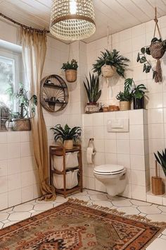 a bathroom with plants on the wall and rug