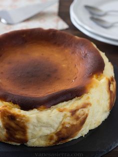 a cake sitting on top of a black plate