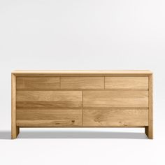 the sideboard is made out of wood and has four drawers on one side, with two