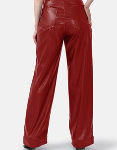 Bassline – Red Vegan Leather Straight-Leg PantsThese red vegan leather straight-leg pants bring together the composure and feel of designer tailoring for a remarkably comfortable fit. Featuring golden buttons, loose hanging belt tie, and a subtle pleated pant aesthetic, the pants are an excellent option for elevating any fashionable ensemble. The Mid-weight fabric is perfect for interseason wear in either cool or warm climates. Artisanaly crafted, they are durable and made to last.Details: Top B