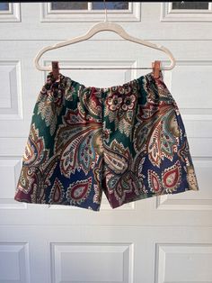 Handmade One-of-a-Kind Paisley Shorts made from bed linens. Elastic Waistband, Side pockets. ▪️ Material - Cotton ▪️ Preloved in a great condition Size see Measurements Measurements Waist 30"; stretches to 38" Hips 48" Length 15" Feel free to message with any questions!  ▪️ Price includes FREE domestic shipping ▪️ Ships in 1-2 days M-F ▪️ Please message about International shipping Paisley Shorts, Floral Tapestry, Beach Shorts, Paisley Print, Short Outfits, Favorite Outfit, Gender Neutral, Elastic Waist, Paisley