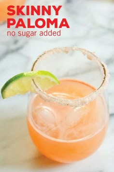 skinnyy paloma no sugar added in a margarita glass with lime garnish