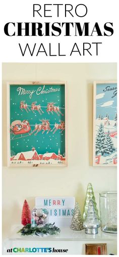 the christmas wall art is displayed in front of two framed pictures