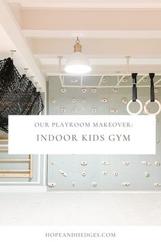 an indoor gym with climbing ropes and hooks on the wall that says, our playroom makeover indoors kids gym