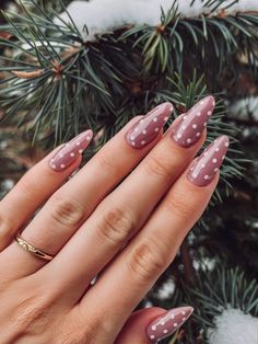 Shine this season with 25 Stunning New Year's Eve Nail Trends for 2025, offering a range of designs from black and gold glamour to short red nails. Whether you prefer almond, oval, or square shapes, these New Year's Eve nails are sure to make a statement. Try dip nails for a sleek and modern look, or keep it simple yet bold with classic colors like black or blue. Nails Acrylic December 2024, Winter Polka Dot Nails, Gelx Inspo Nails Almond, January Nail Art Winter, Classy December Nails, Brown Polka Dot Nails, Almond Winter Nails Designs, Short Almond Acrylic Nails Winter, Nail Inspo Almond Winter