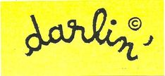 the word darlin written in black ink on yellow paper