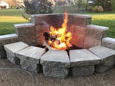 a fire pit with rocks around it