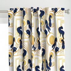 the curtains are decorated with blue and gold designs