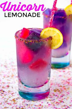 two glasses filled with different colored drinks and garnished with sprinkles