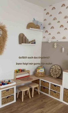 a child's playroom with toys and storage