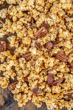 some kind of granola sitting on top of a wooden table