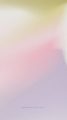 a blurry image of an orange and pink background