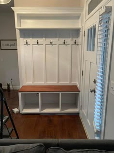 the entryway is clean and ready to be used as a mudroom or office