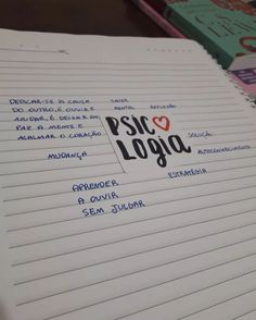 a notebook with the words psrc loga written on it and a red heart