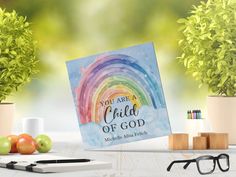 a card that says you are a child of god surrounded by apples and plants