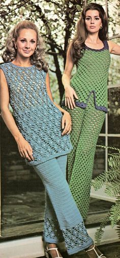 two women in knitted clothing standing next to each other