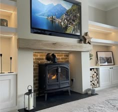 a television mounted above a fireplace in a living room