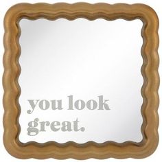 a mirror with the words you look great on it