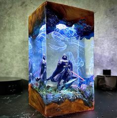 a glass block with a star wars scene in it