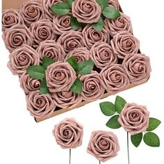 pink roses in a box with green leaves on the stems and another set of flowers next to it