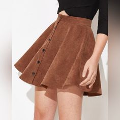 Tan Flowy Skirt Size Medium Never Worn Casual Brown A-line Skirt, Brown A-line Skirt For Spring, Spring Brown A-line Skirt, Winter Mini Skirt For Day Out, Flowy Skort For Fall, Flowy Skirted Skort For Fall, Brown Lined Mini Skirt, Brown Flowy Lined Mini Skirt, Chic Brown Skirted Skort