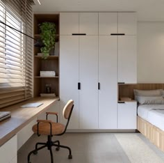 a bedroom with a bed, desk and chair in it