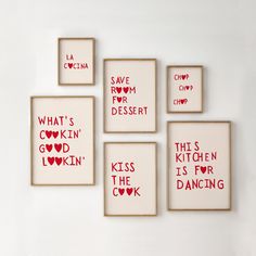 four framed art pieces with words on them