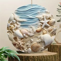 an ornament with seashells and starfish on it