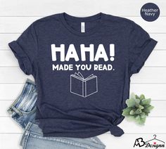 Haha Made You Read Shirt, Funny Librarian Shirt, Book Lover Gift, Reading Shirt,Bookworm Shirt,Book Nerd Shirt, Librarian Gift,Bookish Shirt  HOW TO ORDER  1-Choose your t-shirt size. 2-Choose your t-shirt color. 3-Type your design color (BLACK or WHITE) 4-Select the quantity, 5- Click Add To Cart. For multiple items go back to the listing and repeat the steps.  CARE INSTRUCTIONS  Wash item inside out in cold water Do not bleach Do not dry clean Do not iron directly on the design. *Please aware Book Lovers Shirts, Librarian Shirts Elementary, Bookworm Shirts, Funny Librarian Shirts, Librarian Tshirts, It’s A Good Day To Read A Book Shirt, Book Nerd Shirts, Bookworm Shirt, Librarian Shirt