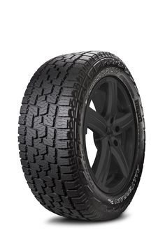 an all terrain tire on a white background