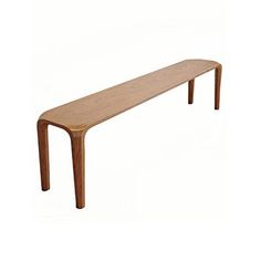 a wooden bench sitting on top of a white floor