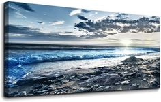 an ocean scene with rocks and the sun in the sky canvas wall art print on metal or plexed wood