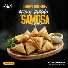 an advertisement for samosa is displayed on a wooden plate with dipping sauce in the background