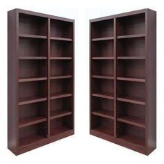 two wooden bookcases with open doors on each side, one is empty and the other has no shelves