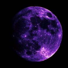 an image of the moon taken from space with purple lighting on it's side