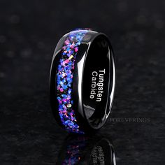 black ceramic ring with multicolored confetti inlay