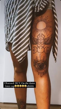 a person with tattoos on their legs