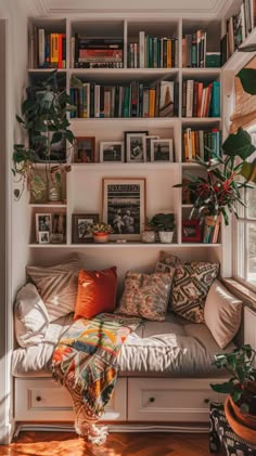 20 Bookshelf Design Ideas for a Chic Home Update How To Design A Bookshelf, Boho Bookshelf Ideas, Closet Turned Into Bookshelf, Living Room Book Shelf Ideas, Cozy Living Room With Bookshelves, Vintage Bookshelf Ideas, Book Case Decor Ideas Office, Unique Bookshelf Ideas, Bedroom Ideas Bookshelf