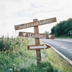 a wooden sign that says james and kate's wedding