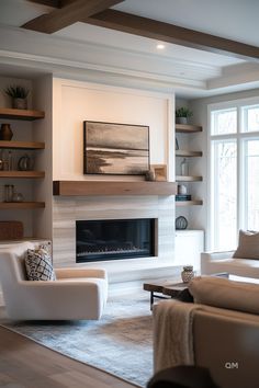 a living room with two couches and a fire place in it's center