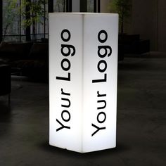 two large white lamps with the words yolop loo and yoloy on them