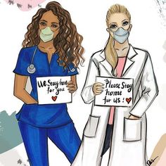 two women in scrubs holding signs with words on them